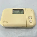 Carrier 7-DAY Programmable Thermostat Model 997-970210-3 TSTATCCPAC01-B. Fixed Price $40.00.