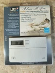 Lux Smart Temp TX1500E Programmable Thermostat 5-1-1 Model Brand New Sealed Box. Fixed Price $70.00.