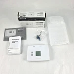 Honeywell Home 1000 TH1110DH1003 Non-programmable Thermostat New Open Box. Fixed Price $26.99.