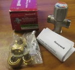 Nib. Honeywell Thermostatic Mixing Valve Cat# AM101-US-1LF .. UM-55. Fixed Price $120.00.