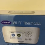 This Carrier Wi-fi Thermostat (model TC-WHS01). Used Good Condition. Fixed Price $100.00.
