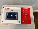 Trane XL824 Smart Thermostat Wifi Touchscreen TCONT824AS52DA New. Fixed Price $269.95.