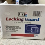 Lux Locking Thermostat Guard A772001. Fixed Price $15.00.