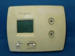 Honeywell RTH3100C Digital Non-programmable Thermostat W/ Missing Cover. Fixed Price $30.00.