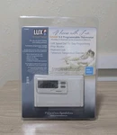 Lux Smart Temp TX-500E 5-2 Programmable Thermostat Digital White Wall Mount. Fixed Price $50.00.